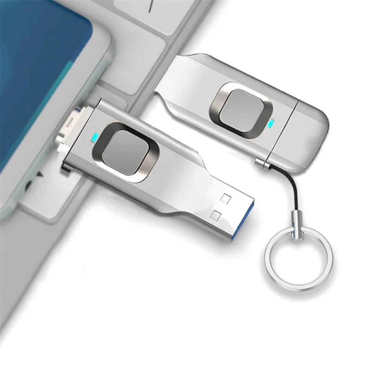 SecureKey USB drive plugged into laptop with keyring attachment